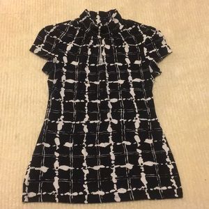 Black and white short sleeved turtleneck top